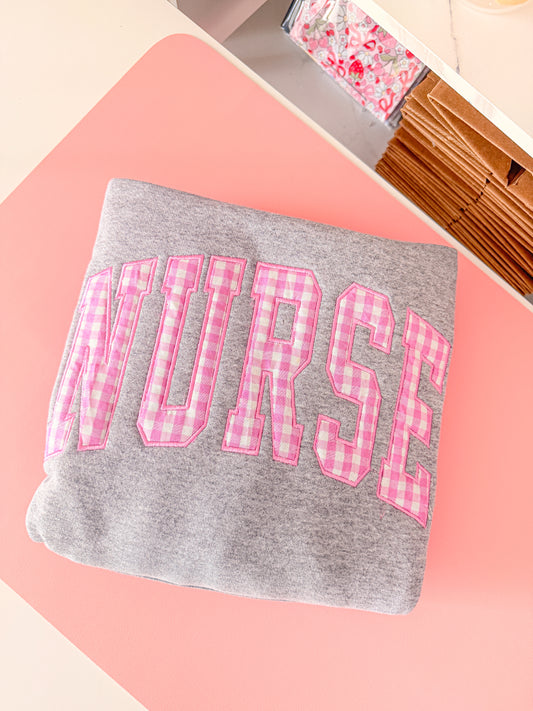 Hoodie NURSE con aplique